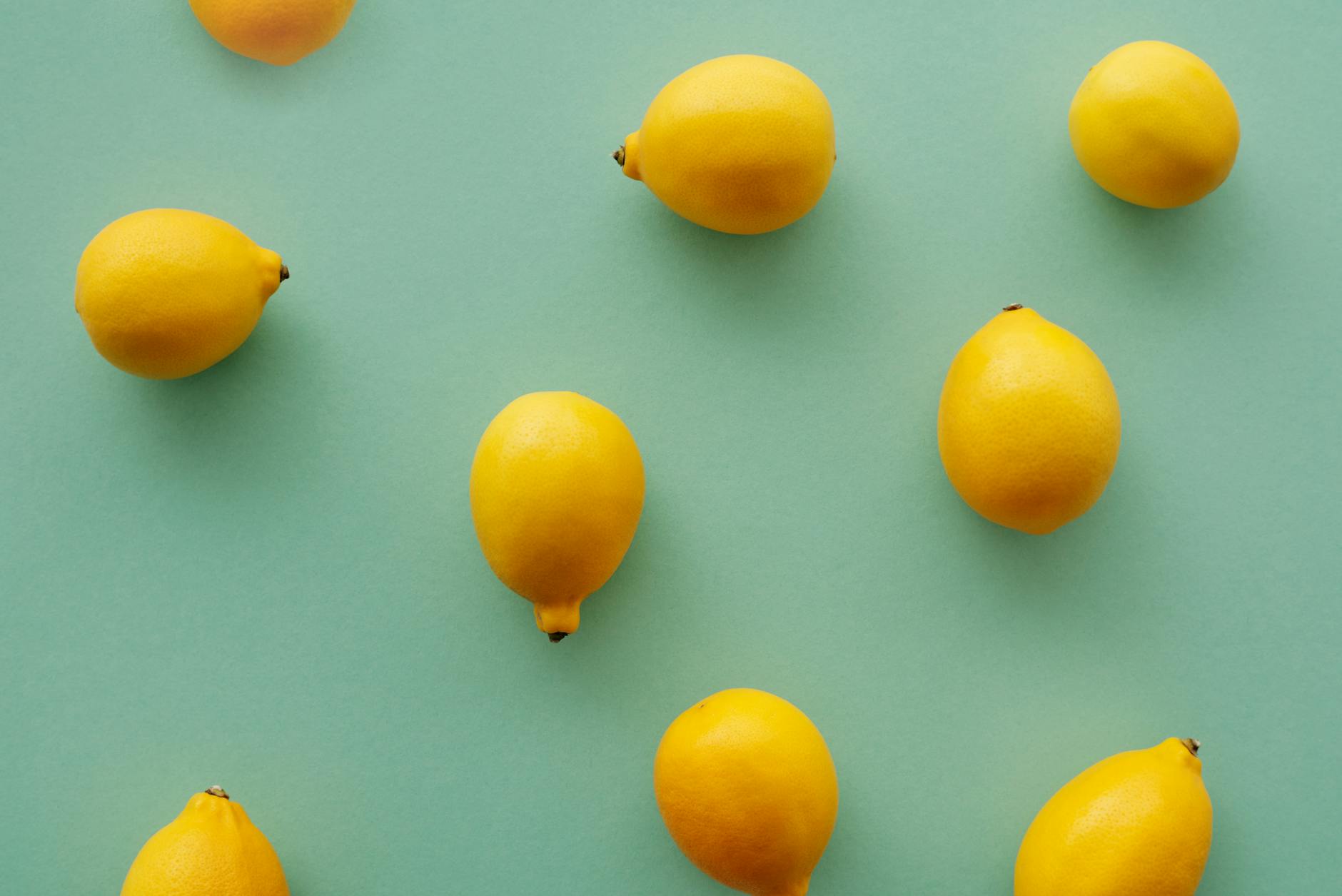 Two hands reaching toward each other with a lemon between them, symbolizing reconnection and fresh intimacy.